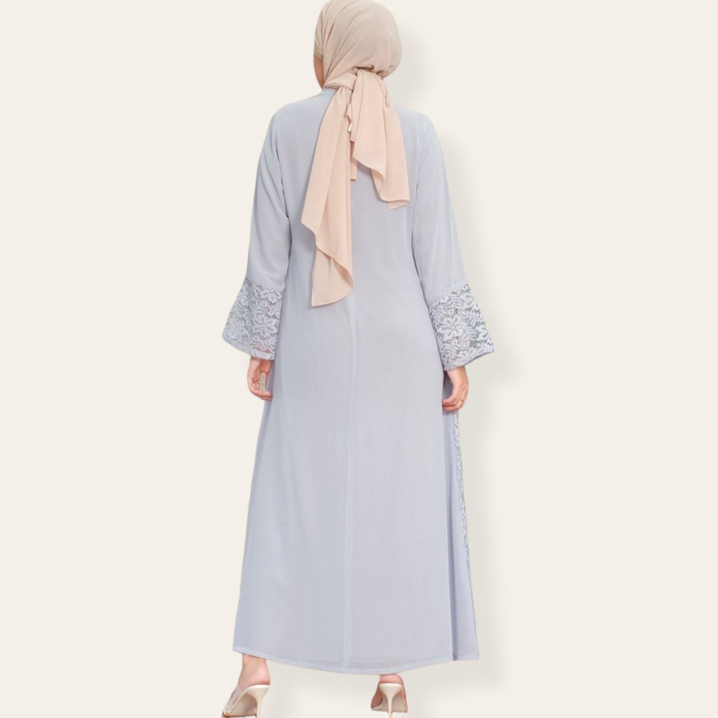 Blue abaya dress with brocade feature on top and zipper at back